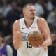 Denver Nuggets center Nikola Jokic reacts after being called for a foul in the second half of an NBA basketball game against the Phoenix Suns Friday, March 7, 2025, in Denver. (AP Photo/David Zalubowski)