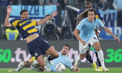Parma's Simon Sohm, left, in action with Lazio's Mattia Zaccagni, center, and Matteo Guendouzi during the Italian Serie A soccer match between Lazio and Parma at the Rome's Olympic stadium, Italy Monday, April 28, 2025. (Alfredo Falcone/LaPresse via AP)