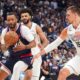 Los Angeles Clippers guard Norman Powell, front left, drives to the basket as Denver Nuggets guard Jamal Murray, back left, and center Nikola Jokic defend in the second half of Game 5 of an NBA basketball playoff series Tuesday, April 29, 2025, in Denver. (AP Photo/David Zalubowski)