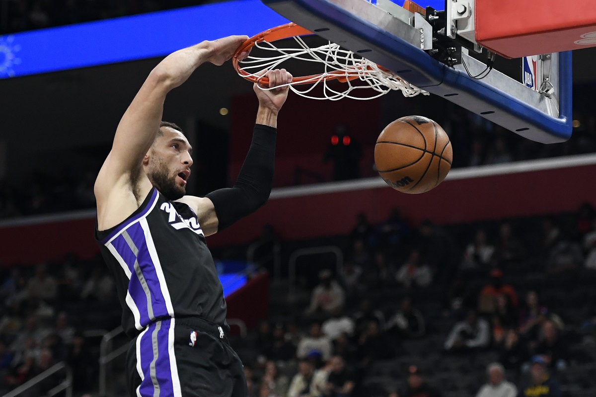Sacramento Kings guard Zach LaVine dunks during the first half of an NBA basketball game against the Detroit Pistons, Monday, April 7, 2025, in Detroit. (AP Photo/Jose Juarez)