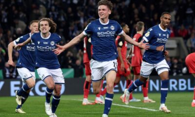 Bielefeld's Maximilian Gro'er, center, celebrates scoring their side's second goal of the game during the German soccer cup, DFB Pokal, semi-final soccer match between Arminia Bielefeld and Bayer Leverkusen in Bielefeld, Germany, Tuesday, April 1, 2025. (Friso Gentsch/dpa via AP)