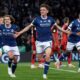 Bielefeld's Maximilian Gro'er, center, celebrates scoring their side's second goal of the game during the German soccer cup, DFB Pokal, semi-final soccer match between Arminia Bielefeld and Bayer Leverkusen in Bielefeld, Germany, Tuesday, April 1, 2025. (Friso Gentsch/dpa via AP)