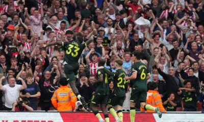 Brentford's Yoane Wissa (11) celebrates after scoring his side's first goal against Arsenal during the English Premier League soccer match between Arsenal and Brentford at Emirates Stadium in London, Saturday, April 12, 2025. (AP Photo/Frank Augstein)