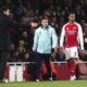 Arsenal's Gabriel, right, leaves the pitch after picking up an injury during the English Premier League soccer match between Arsenal and Fulham at Emirates stadium in London, Tuesday, April 1, 2025. (John Walton/PA via AP)