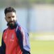 Manchester United manager Ruben Amorim attends a training session ahead of the Europa League quarterfinal first leg soccer match against Lyon, at Trafford Training Centre, Carrington, England, Wednesday, April 9, 2025. (Martin Rickett/PA via AP)