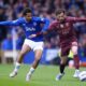 Everton's Iliman Ndiaye, left, and Manchester City's Bernardo Silva battle for the ball during the English Premier League soccer match between Everton and Manchester City at Goodison Park, Liverpool, England, Saturday April 19, 2025. (Peter Byrne/PA via AP)