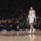 Boston Celtics' Kristaps Porzingis reacts after scoring a three point basket during the second half of an NBA basketball game against the New York Knicks, Tuesday, April 8, 2025, in New York. (AP Photo/Pamela Smith)