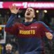 Denver Nuggets center Nikola Jokic jokes with teammates as they warm up to face the Indiana Pacers in the first half of an NBA basketball game Sunday, April 6, 2025, in Denver. (AP Photo/David Zalubowski)