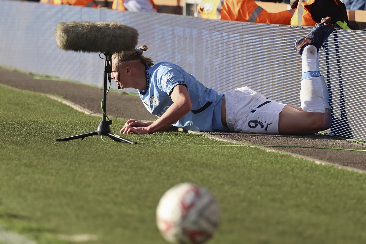 Manchester City's Erling Haaland reacts after sustaining an injury during the English FA Cup quarterfinal soccer match between Bournemouth and Manchester City at the Vitality stadium in Bournemouth, England, Sunday, March 30, 2025. (AP Photo/Ian Walton)