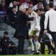 Real Madrid's Kylian Mbappe walks past Real Madrid's head coach Carlo Ancelotti after being replaced during the Champions League quarterfinals second leg soccer match between Real Madrid and Arsenal at the Santiago Bernabeu stadium in Madrid, Wednesday, April 16, 2025. (AP Photo/Manu Fernandez)
