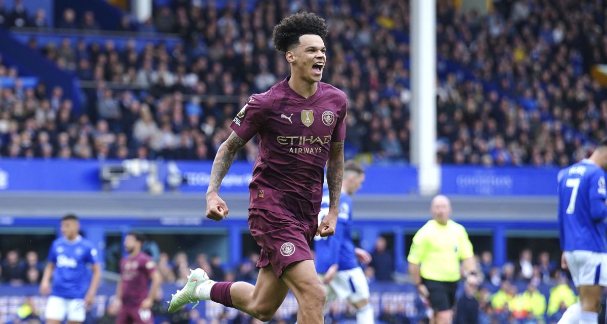 Manchester City's Nico O'Reilly celebrates scoring during the English Premier League soccer match between Everton and Manchester City at Goodison Park, Liverpool, England, Saturday April 19, 2025. (Peter Byrne/PA via AP)