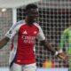 Arsenal's Bukayo Saka celebrates after scoring his side's second goal during the English Premier League soccer match between Arsenal and Fulham at Emirates stadium in London, Tuesday, April 1, 2025. (AP Photo/Kirsty Wigglesworth)
