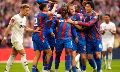 Crystal Palace's Eberechi Eze, center, celebrates with teammates after scoring the opening goal of game during the English FA Cup semifinal soccer match between Crystal Palace and Aston Villa at the Wembley stadium in London, Saturday, April 26, 2025. (Nick Potts/PA via AP)