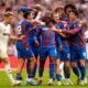 Crystal Palace's Eberechi Eze, center, celebrates with teammates after scoring the opening goal of game during the English FA Cup semifinal soccer match between Crystal Palace and Aston Villa at the Wembley stadium in London, Saturday, April 26, 2025. (Nick Potts/PA via AP)