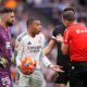 eal Madrid's Kylian Mbappe, center, argues with the referee Guillermo Cuadra during a Spanish La Liga soccer match between Real Madrid and Valencia at the Santiago Bernabeu stadium in Madrid, Spain, Saturday, April 5, 2025. (AP Photo/Manu Fernandez)