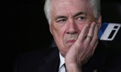 Real Madrid's head coach Carlo Ancelotti sits on the bench prior to the Spanish La Liga soccer match between Real Madrid and Athletic Bilbao at the Santiago Bernabeu stadium in Madrid, Sunday, April 20, 2025. (AP Photo/Manu Fernandez)