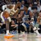Los Angeles Lakers forward LeBron James (23) handles the ball as Minnesota Timberwolves guard Anthony Edwards (5) defends during the first half of Game 4 of an NBA basketball first-round playoff series, Sunday, April 27, 2025, in Minneapolis. (AP Photo/Abbie Parr)