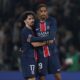 PSG's Vitinha, left, and Bradley Barcola stand. dejected after the League One soccer match between PSG and Nice in Paris Friday, April 25, 2025. (AP Photo/Thibault Camus)