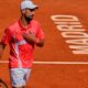 Novak Djokovic of Serbia competes against Matteo Arnaldi of Italy at the Madrid Open tennis tournament in Madrid, Spain, Saturday, April 26, 2025. (AP Photo/Manu Fernandez)