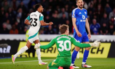Newcastle United's Jacob Murphy, left, celebrates scoring their side's second goal of the game during the English Premier League soccer match between Leicester City and Newcastle United at the King Power Stadium, Leicester, England, Monday, April 7, 2025. (Mike Egerton/PA via AP)