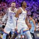 Oklahoma City Thunder center Isaiah Hartenstein, left, and forward Jalen Williams (8) react after a dunk by Williams during the first half in Game 1 of an NBA first-round playoff series against the Memphis Grizzles, Sunday, April 20, 2025, in Oklahoma City. (AP Photo/Nate Billings)