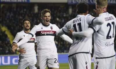 Bologna's Thijs Dallinga, second left, scores their side's third goal of the game during the Italian Cup, semi-final, first leg soccer match between Empoli and Bologna at the Renato Castellani stadium, in Empoli, Italy, Tuesday April 1, 2025. (Marco Bucco/LaPresse via AP)