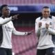 Real Madrid's Vinicius Junior and Kylian Mbappe react, during a training session at the Emirates Stadium, in London, Monday April 7, 2025, a day ahead of the 1st leg Champions League soccer match against Arsenal on Tuesday. (Bradley Collyer/PA via AP)