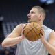 Denver Nuggets center Nikola Jokic warms up before an NBA basketball game against the Sacramento Kings, Wednesday, April 9, 2025, in Sacramento, Calif. (AP Photo/Sara Nevis)