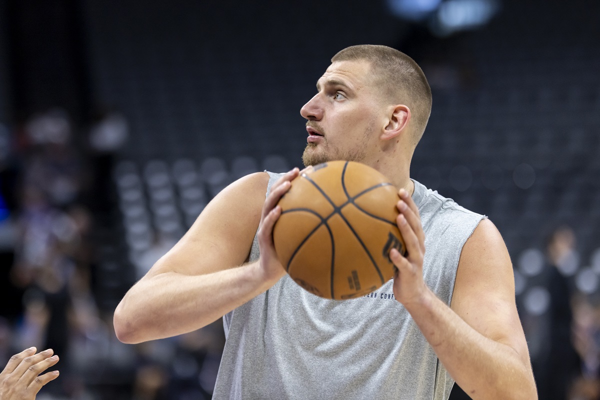 Denver Nuggets center Nikola Jokic warms up before an NBA basketball game against the Sacramento Kings, Wednesday, April 9, 2025, in Sacramento, Calif. (AP Photo/Sara Nevis)