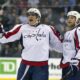 FILE - Washington Capitals Alexander Ovechkin, left, celebrates scoring his 300th NHL career goal with teammate Brooks Laich (21) during first period of an NHL hockey game against the Toronto Maple Leafs, Tuesday, April 5, 2011, in Toronto. (Frank Gunn/The Canadian Press via AP, FIle)