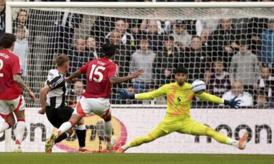 Newcastle United's Harvey Barnes, second left, scores his side's third goal during the English Premier League soccer match between Newcastle United and Manchester United in Newcastle upon Tyne, England, Sunday, April 13, 2025. (Owen Humphreys/PA via AP)