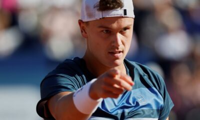 Denmark's Holger Rune reacts during the ATP Barcelona Open tennis final against Spain's Carlos Alcaraz in Barcelona, Spain, Sunday, April 20, 2025. AP Photo/Joan Monfort)