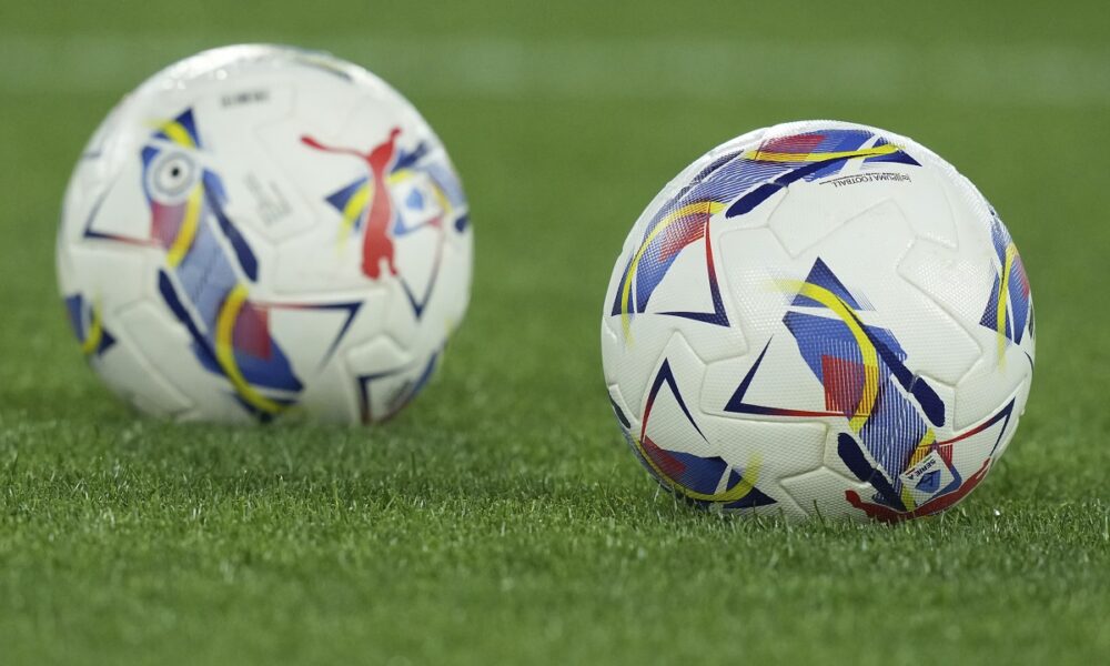 Balls lie on the pitch ahead of the Serie A soccer match between Lazio and Torino at Rome's Olympic stadium, Monday March 31, 2025. (Alfredo Falcone/LaPresse via AP)
