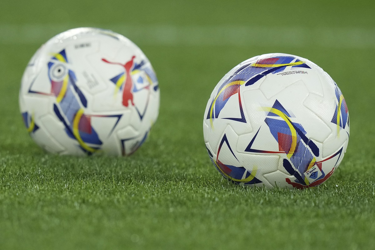 Balls lie on the pitch ahead of the Serie A soccer match between Lazio and Torino at Rome's Olympic stadium, Monday March 31, 2025. (Alfredo Falcone/LaPresse via AP)