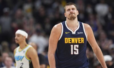 Denver Nuggets center Nikola Jokic reacts after missing last-second, 3-point basket- attempt in the second half of an NBA basketball game against the Indiana Pacers, Sunday, April 6, 2025, in Denver. (AP Photo/David Zalubowski)