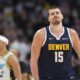 Denver Nuggets center Nikola Jokic reacts after missing last-second, 3-point basket- attempt in the second half of an NBA basketball game against the Indiana Pacers, Sunday, April 6, 2025, in Denver. (AP Photo/David Zalubowski)