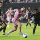 Inter Miami forward Lionel Messi, center, controls the ball during the second half of a CONCACAF Champions Cup second-leg semifinal soccer match against the Vancouver Whitecaps, Wednesday, April 30, 2025, in Fort Lauderdale, Fla. (AP Photo/Lynne Sladky)