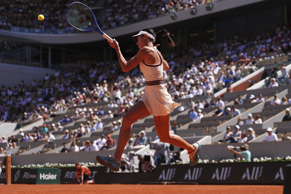 Serbia's Olga Danilovic returns the ball to Aryna Sabalenka of Belarus during their third round match of the French Tennis Open, at the Roland-Garros stadium, in Paris, Friday, May 30, 2025. (AP Photo/Lindsey Wasson)