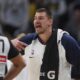 Denver Nuggets center Nikola Jokic yells to teammates from the bench in the second half of Game 5 of an NBA basketball playoff series against the Los Angeles Clippers, Tuesday, April 29, 2025, in Denver. (AP Photo/David Zalubowski)