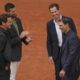 Rafa Nadal, right, is congratulated by Andy Murray, top right, as Roger Federer, left, and Novak Djokovic, during a farewell ceremony at center court Philippe-Chatrier, at the Roland-Garros stadium, in Paris, Sunday May 25, 2025. (AP Photo/Thibault Camus)