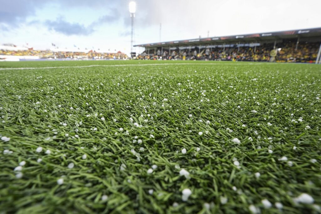 Small pieces of hail are seen before the start of the first leg quarter-final match of the UEFA Europa League between Bodø/Glimt and Lazio at Aspmyra Stadium in Bodo, Norway, Thursday March 13, 2025. (Lise Åserud/NTB Scanpix via AP)