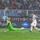 AC Milan's Christian Pulisic, right, makes an attempt to score during the italian Serie A soccer match between Genoa and Milan at the Luigi Ferraris Stadium in Genoa, Italy, Monday, May 5, 2025. (Tano Pecoraro/LaPresse via AP)