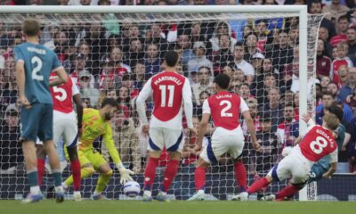 Bournemouth's Evanilson, right, scores his side's second goal during the English Premier League soccer match between Arsenal and Bournemouth at Emirates stadium in London, Saturday, May 3, 2025. (AP Photo/Kin Cheung)
