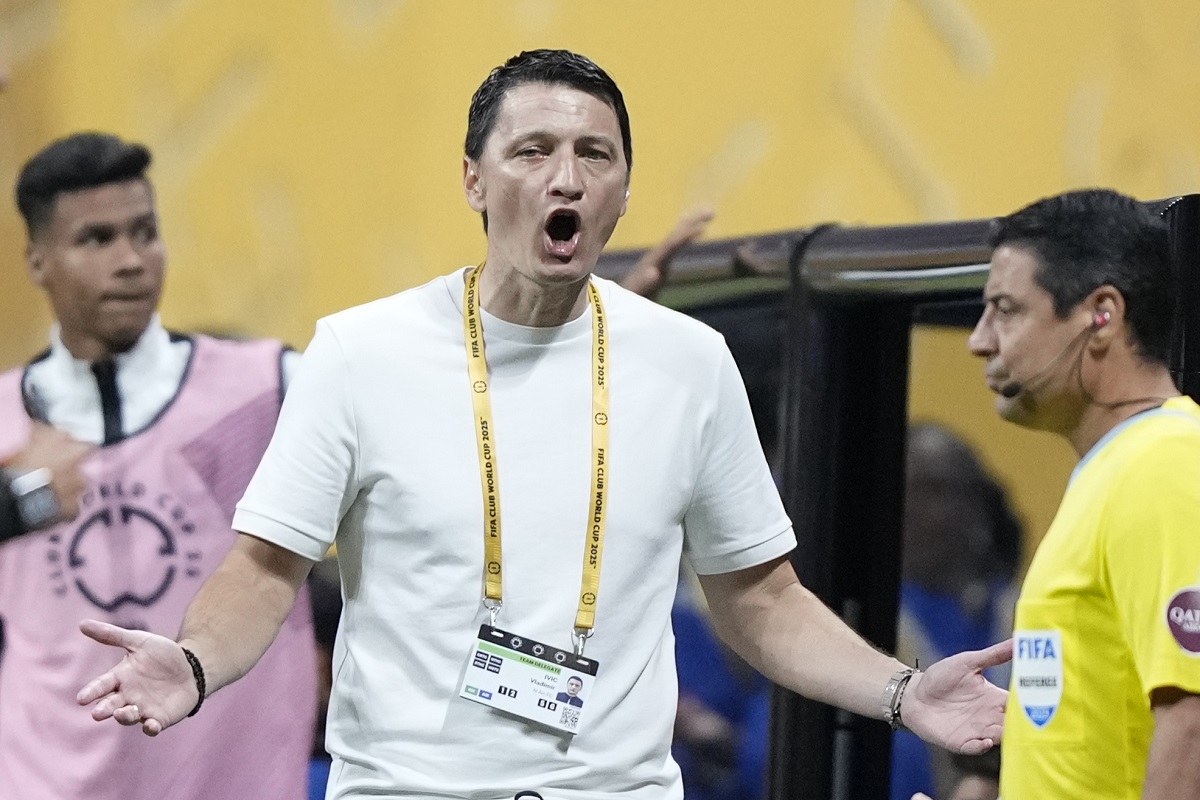 Al Ain manager Vladimir Ivic yells during the Club World Cup Group G soccer match between Manchester City and Al Ain in Atlanta, Sunday, June 22, 2025. (AP Photo/Brynn Anderson)