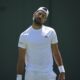 Novak Djokovic of Serbia attends a practice session ahead of the Wimbledon Championships in London, Friday, June 27, 2025. (AP Photo/Kin Cheung)