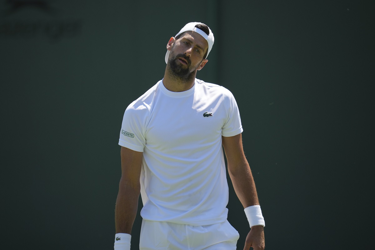 Novak Djokovic of Serbia attends a practice session ahead of the Wimbledon Championships in London, Friday, June 27, 2025. (AP Photo/Kin Cheung)