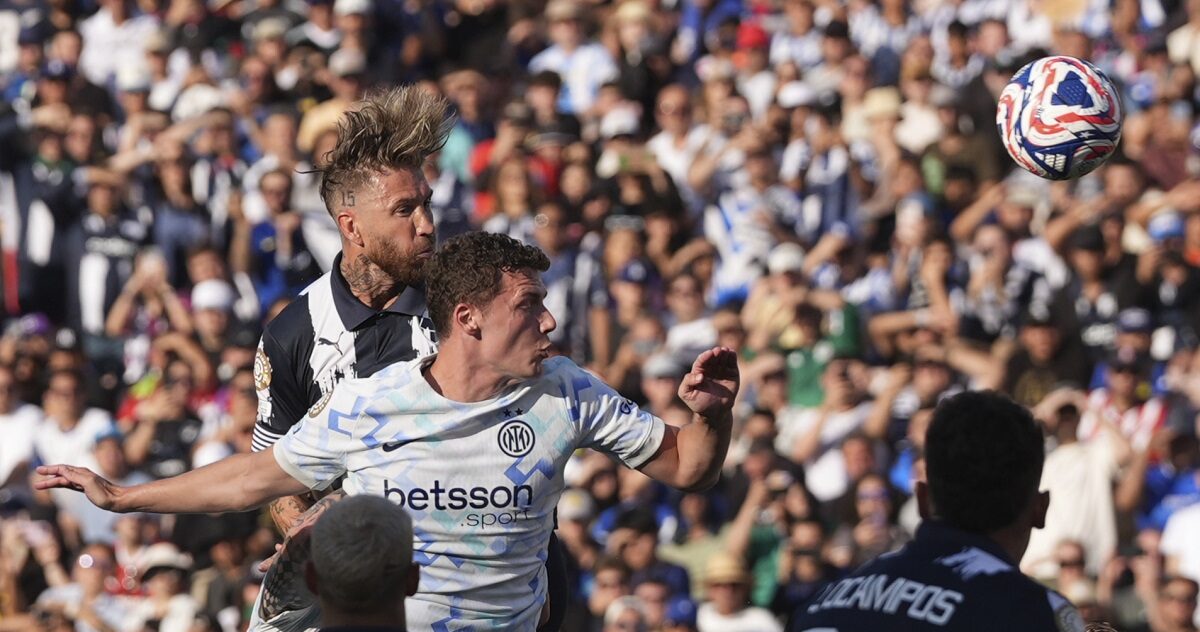 Monterrey's Sergio Ramos, back, scores the opening goal against Inter Milan during the Club World Cup group E soccer match between CF Monterrey and Inter Milan in Pasadena, Calif., Tuesday, June 17, 2025. (AP Photo/Gregory Bull)