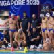 Serbia's head coach Uros Stevanovic speaks to players during a men's water polo semifinal match between Serbia and Hungary at the World Aquatics Championships in Singapore, Tuesday, July 22, 2025. (AP Photo/Vincent Thian)