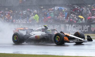 McLaren driver Lando Norris of Britain steers his car as it rains during the British Formula One Grand Prix race at the Silverstone racetrack in Silverstone, England, Sunday, July 6, 2025. (AP Photo/Darko Bandic)