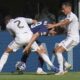 Paris Saint-Germain's Lee Kang-in (19), Real Madrid's Dani Carvajal (2) and Lucas Vazquez (17) battle for the ball during the Club World Cup semifinal soccer match between PSG and Real Madrid in East Rutherford, N.J., Wednesday, July 9, 2025. (AP Photo/Seth Wenig)
